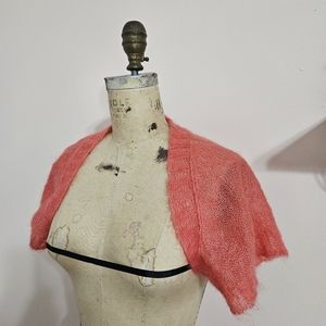 Hand knit pink silk mohair shrug.